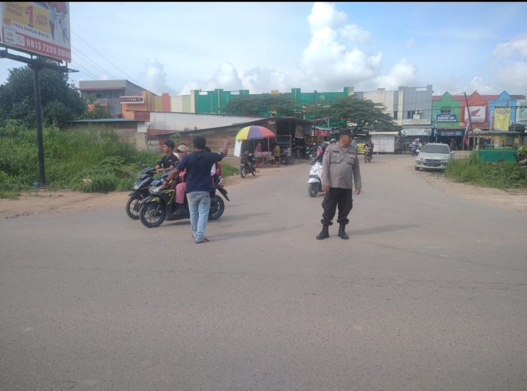 Personil Polsek Sungai Beduk Polresta Barelang Laksanakan Strong Point Pagi antisipasi kemacetan pada pagi hari
