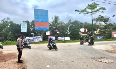 Personil Polsek Sungai Beduk Polresta Barelang Laksanakan Strong Point Pagi antisipasi kemacetan pada pagi hari