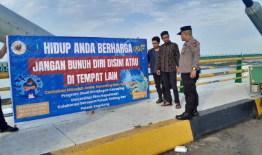 Pemasangan Spanduk Himbauan di Jembatan Barelang oleh Polsek Sagulung dan Mahasiswa Unrika Batam