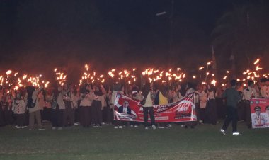 Polres Lingga Kawal Tradisi Taptu dan Pawai Obor Sambut HUT ke-80 Kemerdekaan RI