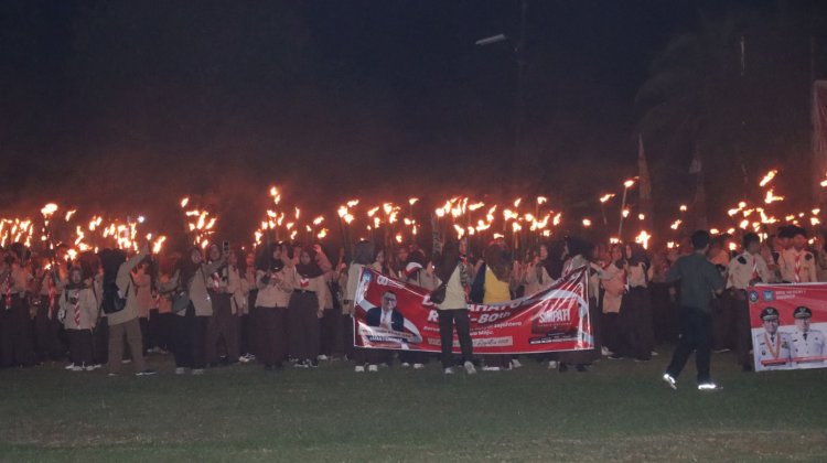 Polres Lingga Kawal Tradisi Taptu dan Pawai Obor Sambut HUT ke-80 Kemerdekaan RI