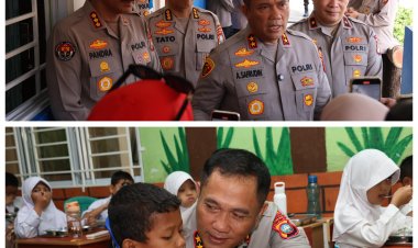 KAPOLDA KEPRI TINJAU LANGSUNG PROGRAM MAKAN BERGIZI GRATIS DI SDN 001 NONGSA