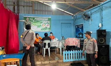 Personel Polsek Senayang Hadir Berikan Rasa Aman pada Pengobatan Gratis di Desa Tajur Biru