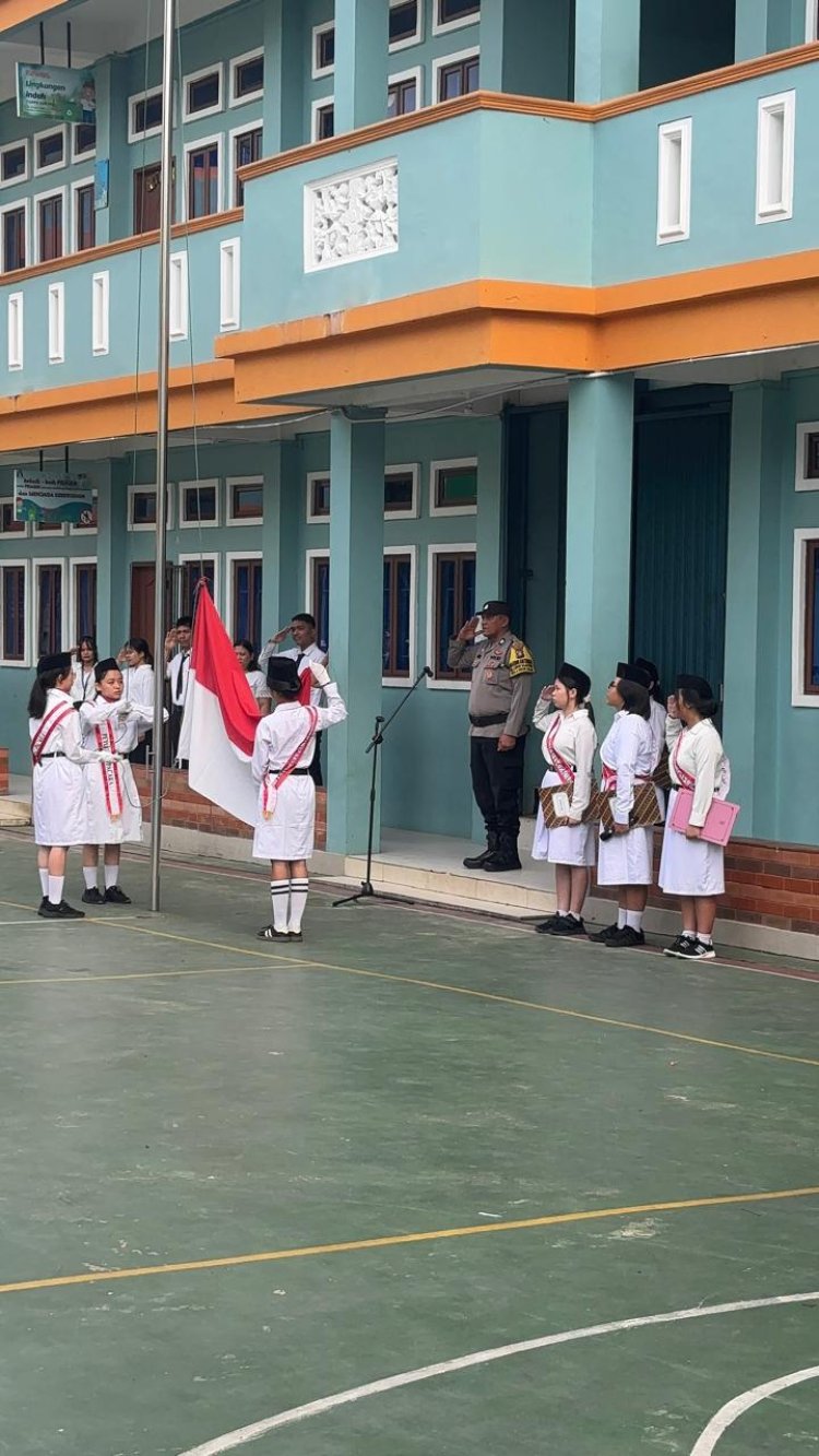Bhabinkamtibmas Lubuk Baja Kota Jadi Pembina Upacara dan Beri Edukasi Anti-Bullying di SMK Advent