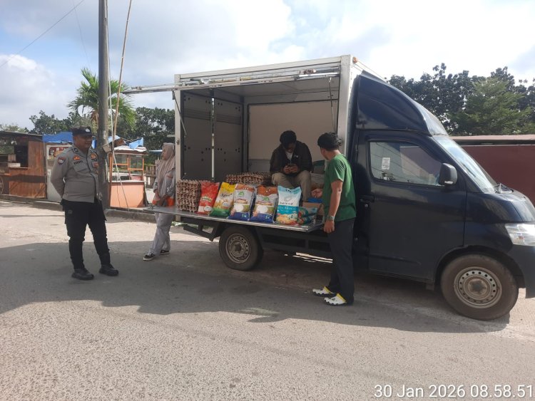 Polsek Sei Beduk Bersinergi dengan Bulog Gelar Gerakan Pangan Murah di Pasar BTC Bida Ayu