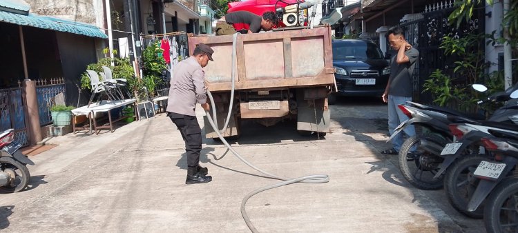 Polsek Batu Ampar Laksanakan Pengamanan Pendistribusian Air Bersih Hari Ke-40 di Tanjung Sengkuang dan Batu Merah