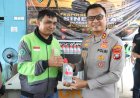 Polresta Barelang Gelar Bakti Sosial Pembagian Oli dan Cuci Kendaraan Gratis untuk Driver Online Batam