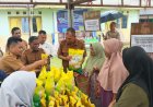 Pastikan Kegiatan Berjalan Lancar, Bhabinkamtibmas Polsek Daik Lingga Hadiri dan Amankan Pasar Murah TPID