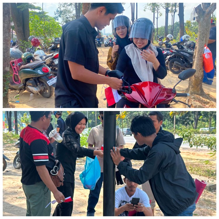 Sihumas dan Sitik Polresta Barelang Bersinergi Bagikan Bendera Merah Putih kepada Pengguna Sepeda Motor Sambut HUT Ke-81 Kemerdekaan Republik Indonesia