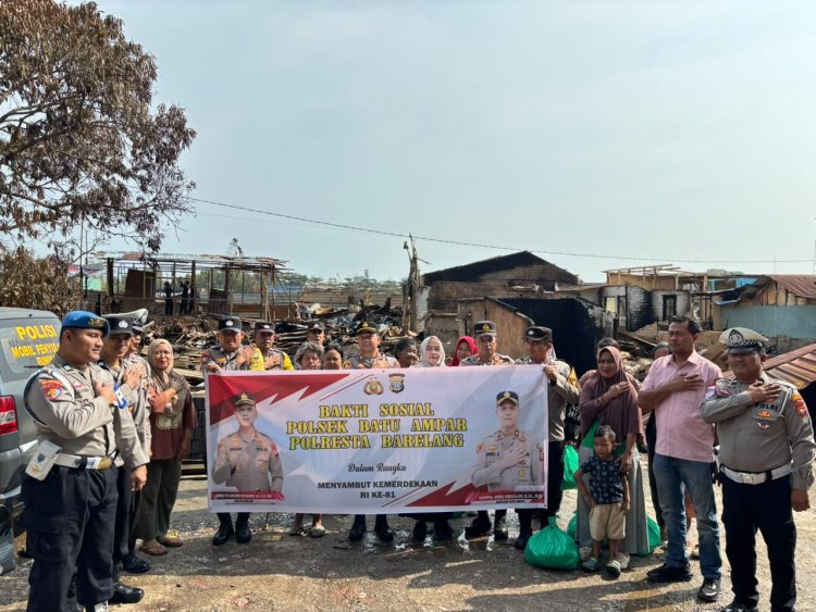 Polsek Batu Ampar Salurkan 50 Paket Sembako untuk Korban Kebakaran Pantai Stress